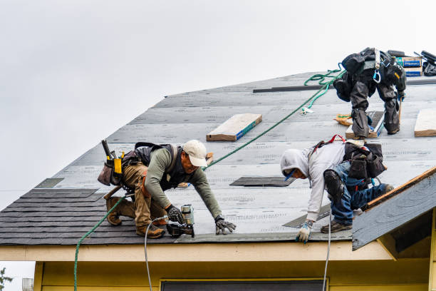 Professional Roofing technician working in Anderson, CA